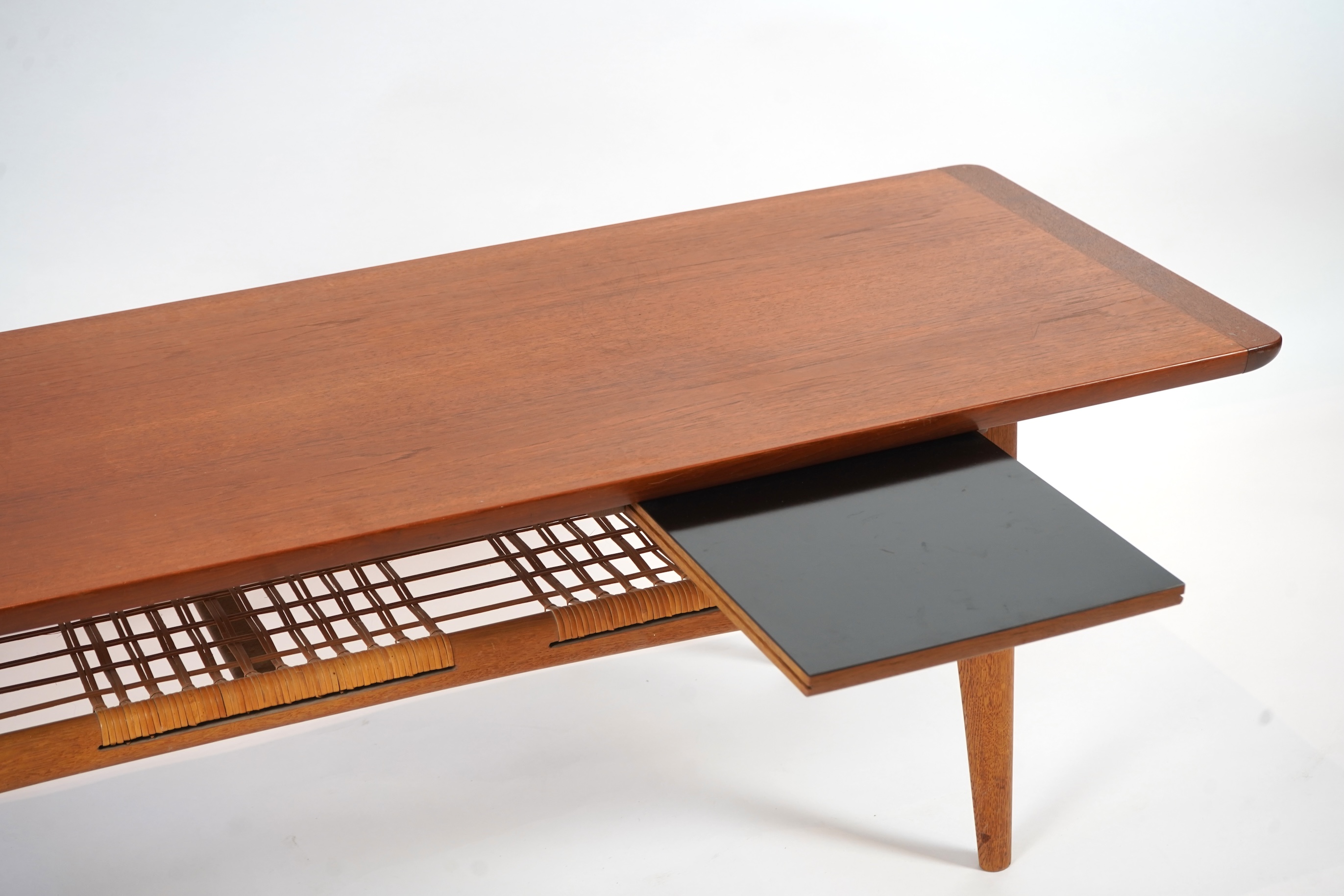 Manner of Trioh Møbler, Denmark: A mid-century teak coffee table